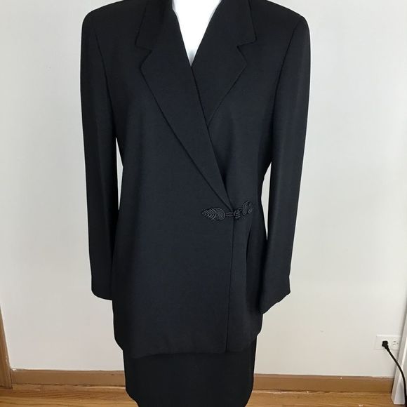 Ellen Tracy black 100% silk 3 pc suit. Jacket size 14. Pants and skirt size 12.